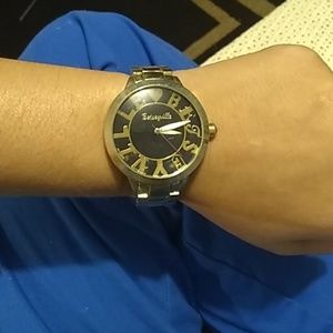 Betseyville gold watch